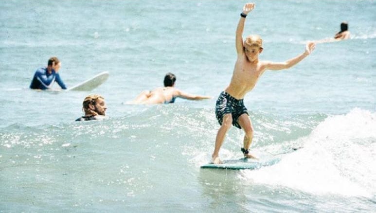 boy on the surf desk